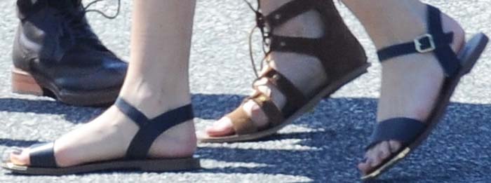 Bella Thorne's feet in black Steve Madden sandals